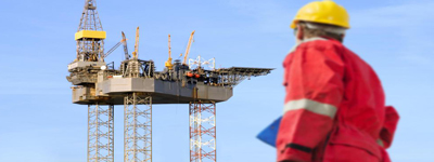 engineer-looks-at-oil-rig-400x150